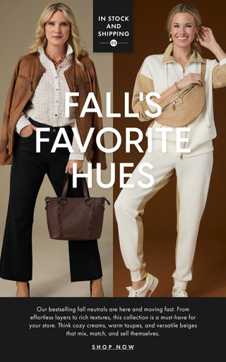 Two woman modeling fall outfits on a brown background promoting neutrals collection