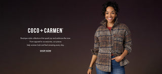 Model wearing fall outfit on dark background.