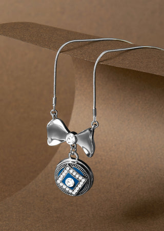 Interchangeable snap necklace on brown background.