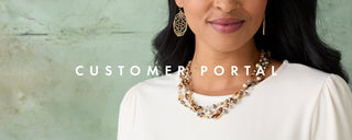 A close-up of a woman wearing a chunky gold and white beaded statement necklace and matching drop earrings, with the text 'CUSTOMER PORTAL' overlaid across the center.