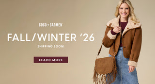 A promotional fashion graphic with the text 'COCO + CARMEN FALL/WINTER '26 SHIPPING SOON! LEARN MORE' on the left, and a smiling woman on the right wearing a brown shearling-lined jacket, blue denim skirt, and carrying a brown fringe shoulder bag against a beige background.