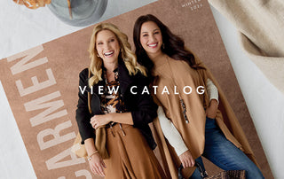 A styled flat-lay of a fashion catalog page featuring two women modeling warm-toned outerwear, with the text 'VIEW CATALOG' overlaid across the center and 'WINTER 2024' in the top right.