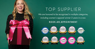 Woman holding a large gift box with a pink ribbon against a green background, featuring top supplier accolades.