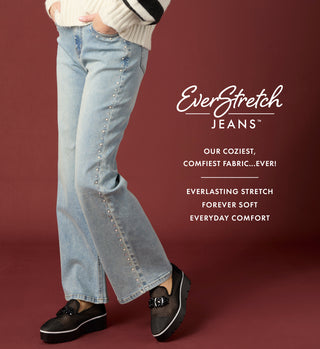 Model wearing light denim jeans featuring 'EVERSTRETCH' on a maroon background.