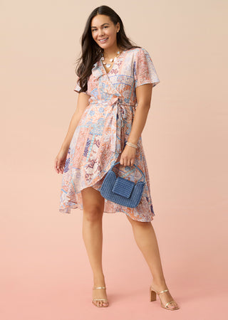 Shop apparel. Model wearing summer printed dress.