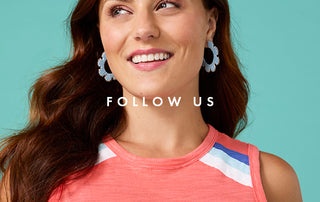 Woman wearing earrings with 'FOLLOW US' text on a teal background