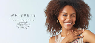 Shop Whispers Spring/Summer '25. Woman model wearing multi-oval hoop earrings.