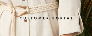 Close-up of a beige robe with a belt, text overlay 'CUSTOMER PORTAL', and blurred natural background.