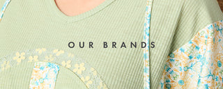 Text 'OUR BRANDS' with floral patterns on a green background