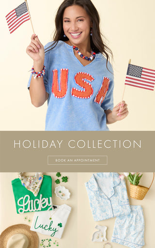Woman wearing a 'USA' shirt with American flags, with a holiday collection banner below.