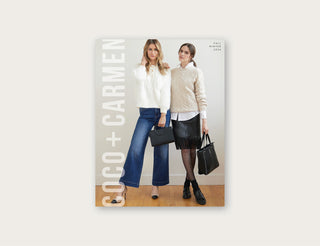 Catalog cover image with COCO +CARMEN logo and features two models. One wearing dark denim jeans and sweater and the other wearing a black skirt with sweater.